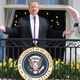 Illustration for article titled Musical Be Best Eggs, Sarah Huckabee Sanders, a Cop Tennis Ball, and Other Scenes From the White House Easter Egg Roll